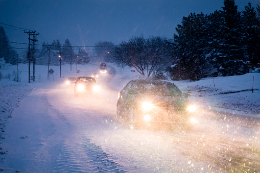 Blizzard on the Road during a Cold Winter Evening in Gaspe, Quebec, Canada