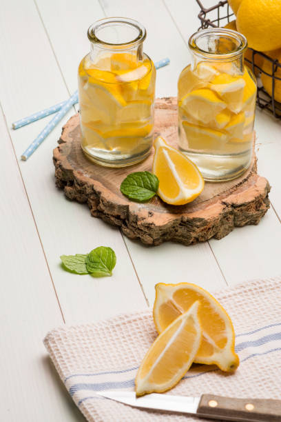 istock Lemon and lime slices in jars 894586828