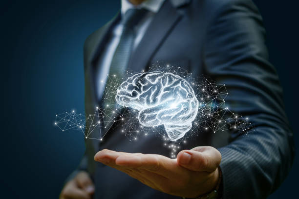 istock Businessman showing the brain as part . 894589976