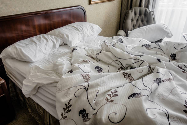 istock Messy Bed in the Morning 894593058