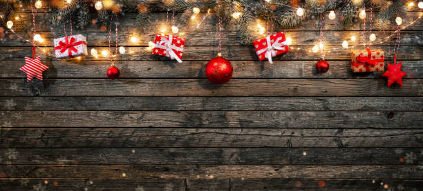 istock Christmas background with wooden decorations and spot lights. 894599724