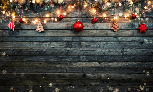 istock Christmas background with wooden decorations and spot lights. 894599758