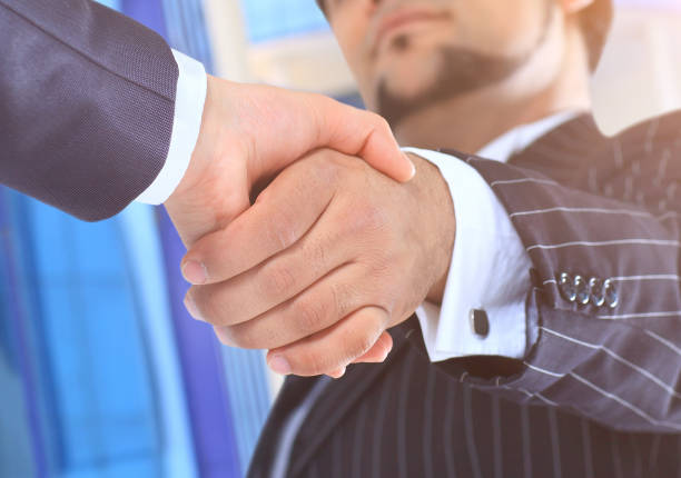 istock The conclusion of the transaction. Handshake 894606144