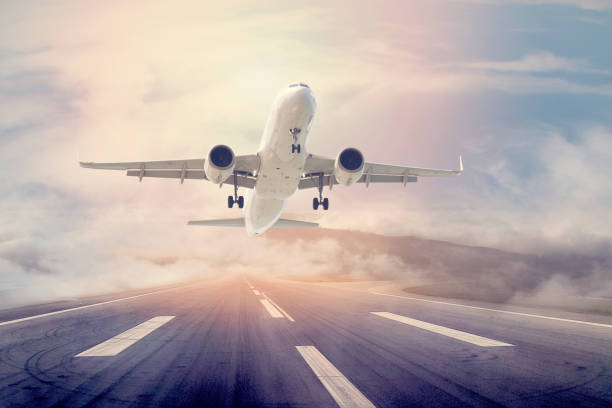 istock Passenger airplane taking off at sunset 894606416