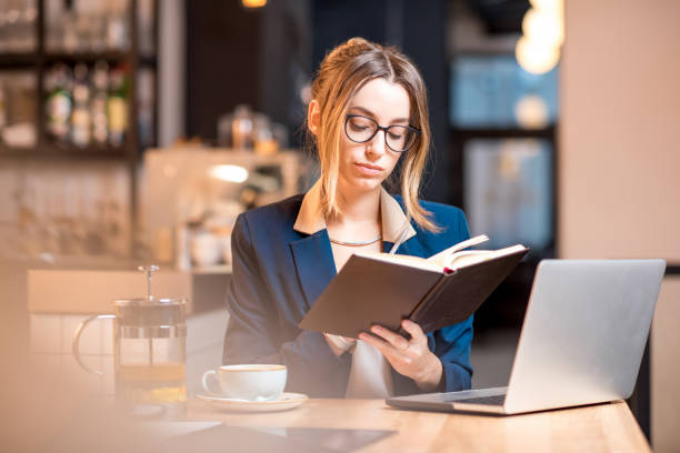 istock Businesswoman working at the cafe 894611282
