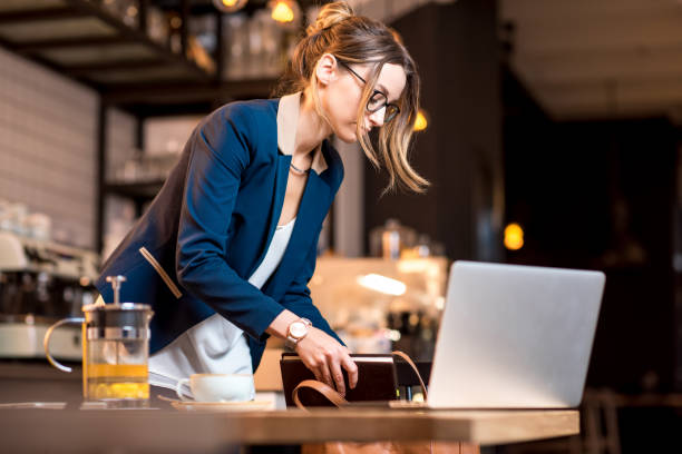 istock Businesswoman at the cafe 894611662
