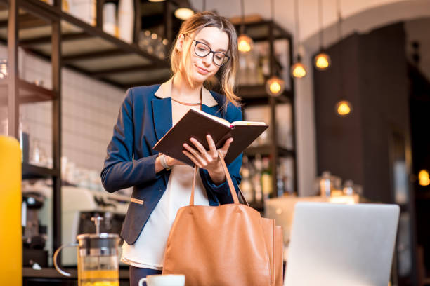 istock Businesswoman at the cafe 894611770