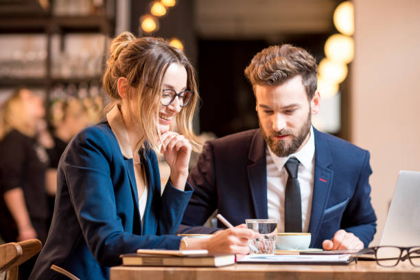 istock Business couple at the cafe 894611942