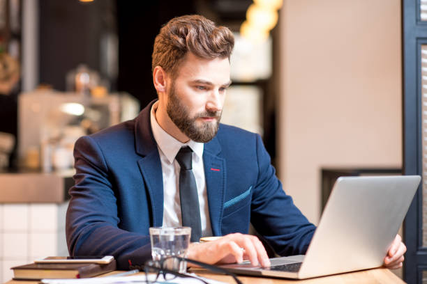 istock Businessman at the cafe 894614738