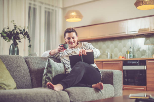 istock Young woman at home 894617906