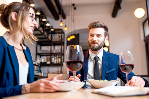 istock Business couple at the restaurant 894618248