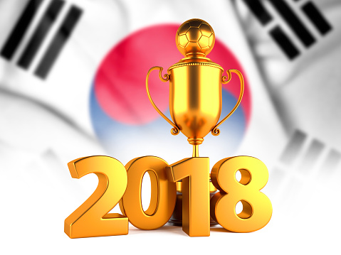 Sport Background with Sport Background with Golden Winner Trophy Cup and 2018 text against the national flag of South Korea
