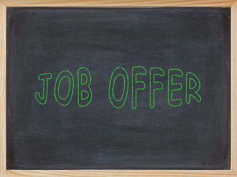 Job Offer meat written on a blackboard to mean a business concept