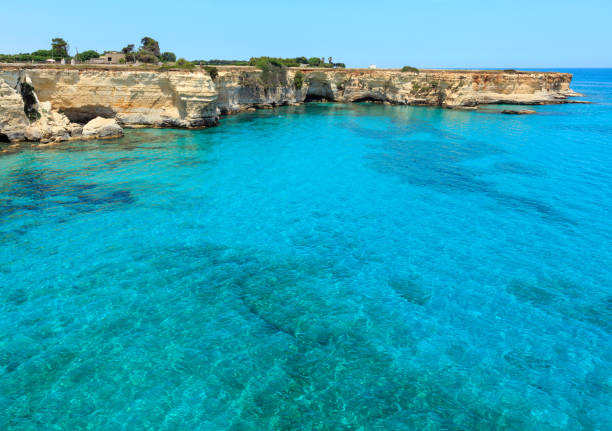 istock Faraglioni at Torre Sant Andrea, Italy 894632416