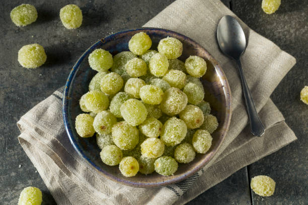 Boozy Sugared Prosecco Grapes Boozy Sugared Prosecco Grapes in a Bowl for Dessert frozen grapes stock pictures, royalty-free photos & images