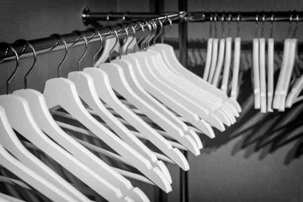 istock White hangers in the wardrobe 894632556