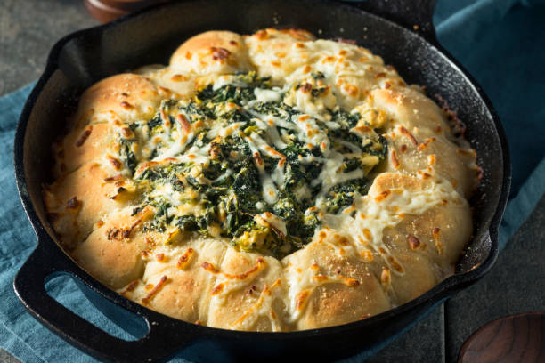 istock Homemade Skillet Bread with Artichoke Dip 894633038