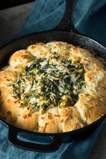 istock Homemade Skillet Bread with Artichoke Dip 894633196