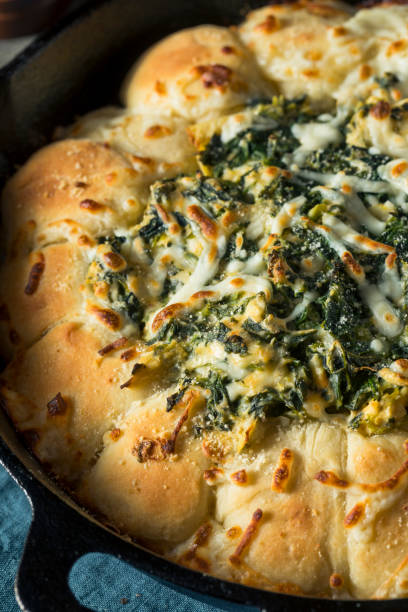 istock Homemade Skillet Bread with Artichoke Dip 894635722