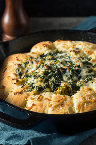 istock Homemade Skillet Bread with Artichoke Dip 894635926