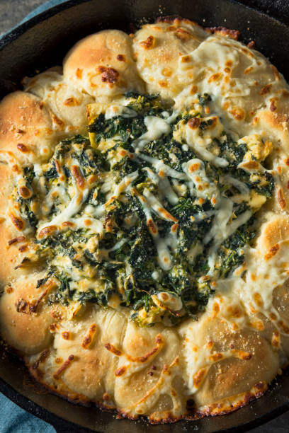 istock Homemade Skillet Bread with Artichoke Dip 894635986