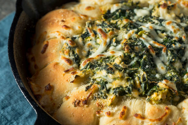 istock Homemade Skillet Bread with Artichoke Dip 894636042
