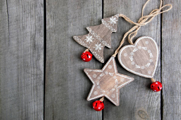 istock Christmas decorations on wooden background 894653896