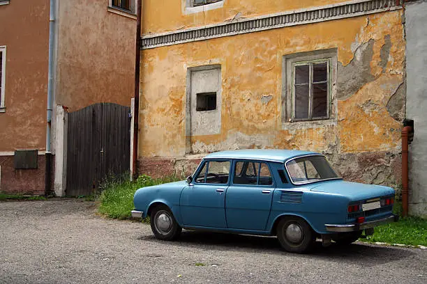 Old car in deserted village
