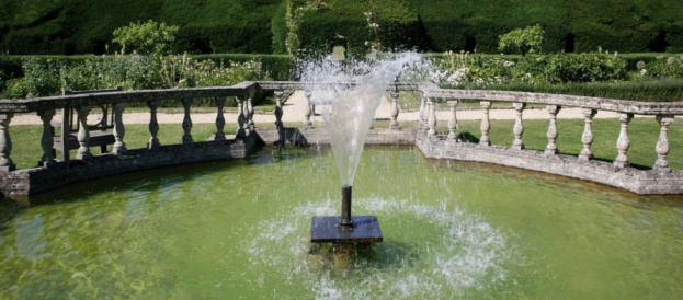 Ornamental fountain. Public park, flowerbed in Vigo, Pontevedra province, Galicia, Spain.