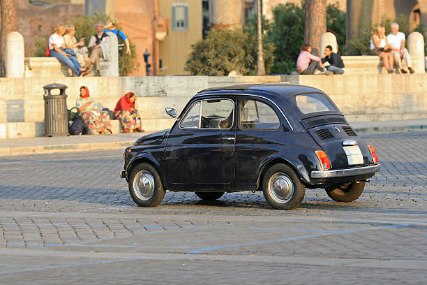 istock Tiny dark blue vintage car, Rome Italy 89465762