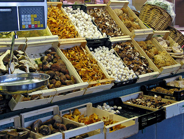 Market stall selling mushrooms stock photo