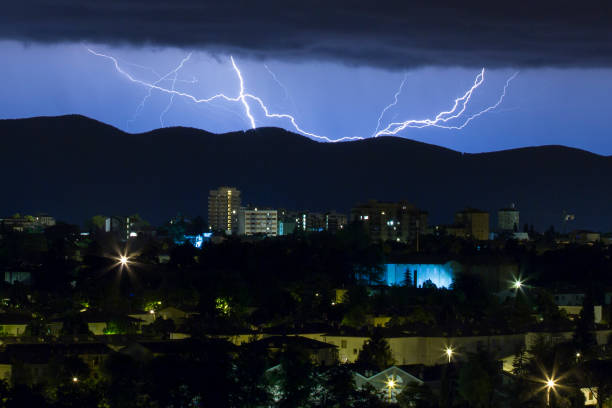 istock Summer storm over city 894667990