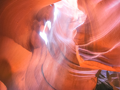Antelope Canyon with perpendicular rays of light at midday. Antelope slot canyon is located east of Page town in United States, Arizona on Navajo land. It's the USA most photographed natural wonder.