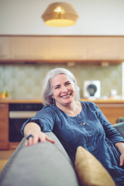 istock Mature woman at home 894673508