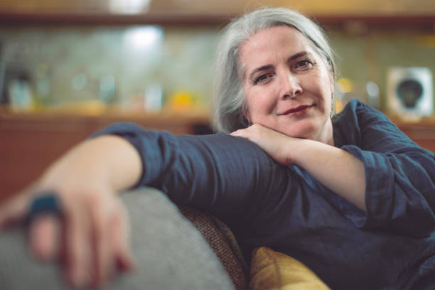 istock Mature woman at home 894676106