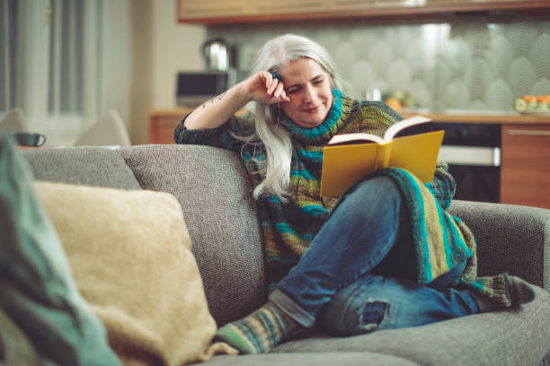 istock Mature woman at home 894678730
