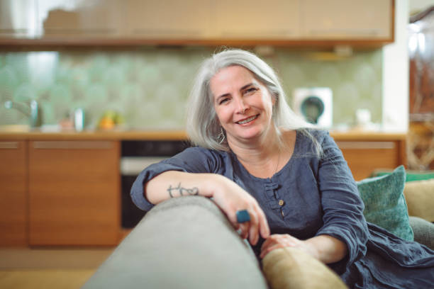 istock Mature woman at home 894681400