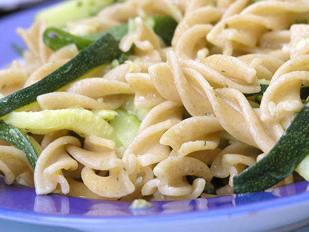 Integral pasta with zucchinis 1 stock photo