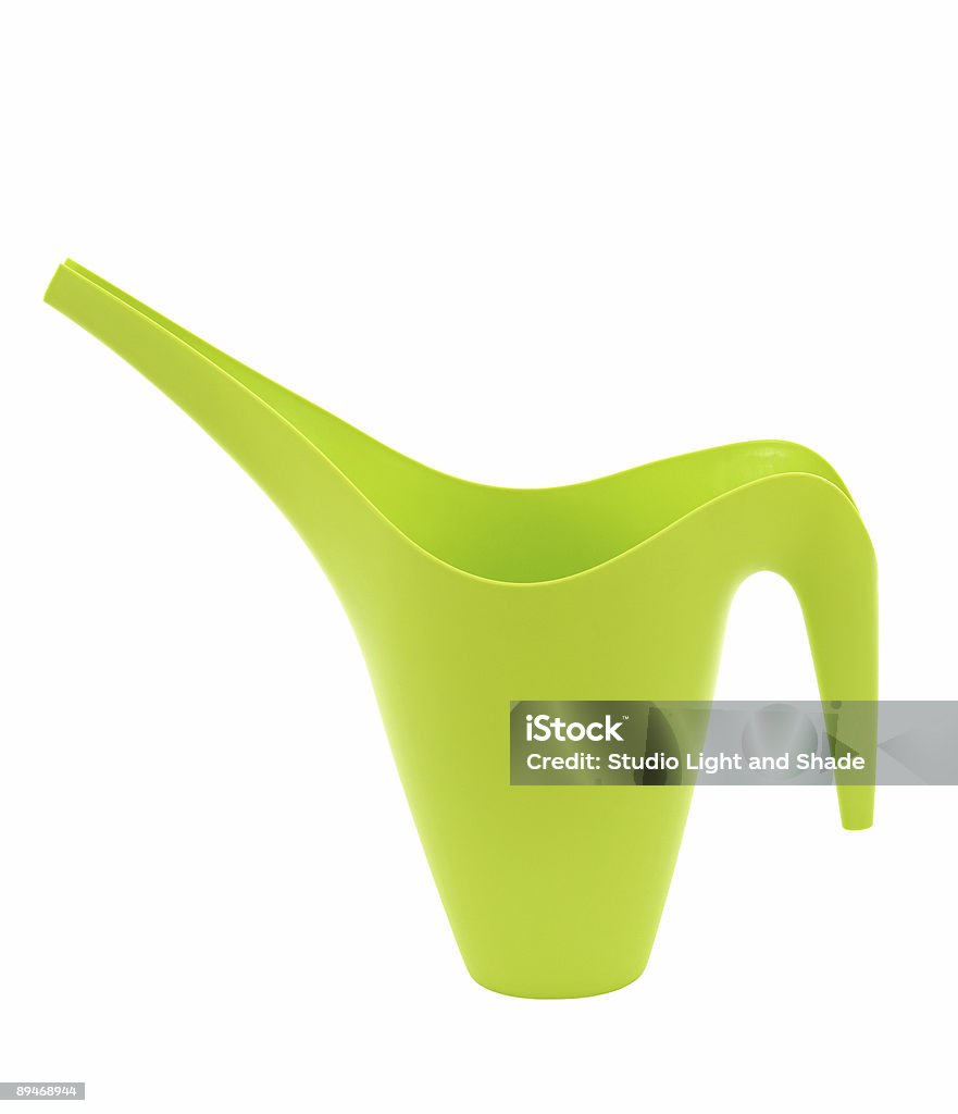 Stylish green watering can Stylish green watering can isolated on white. Color Image Stock Photo