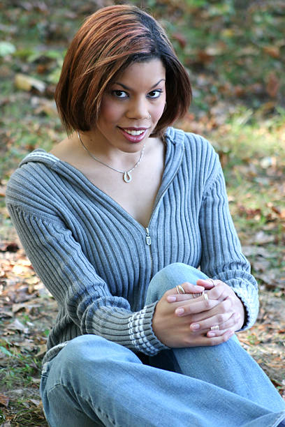 istock young woman sitting 89469312