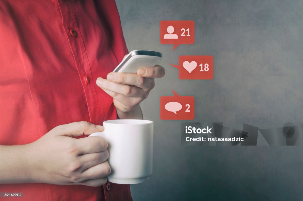 Social media Social media. Social network concept with smart phone and coffee cup. Social Media Stock Photo