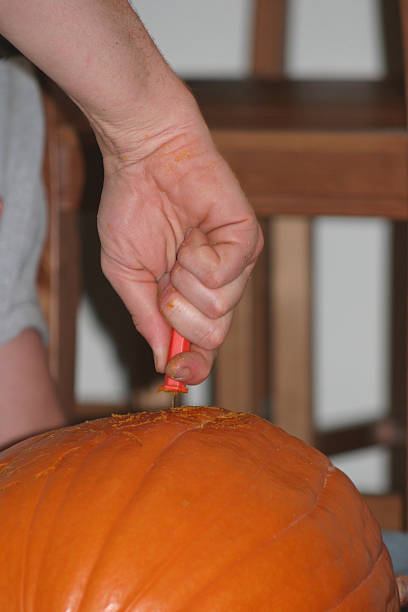 разделочный pumpkins - moving toward human hand beckoning gesturing стоковые фото и изображения