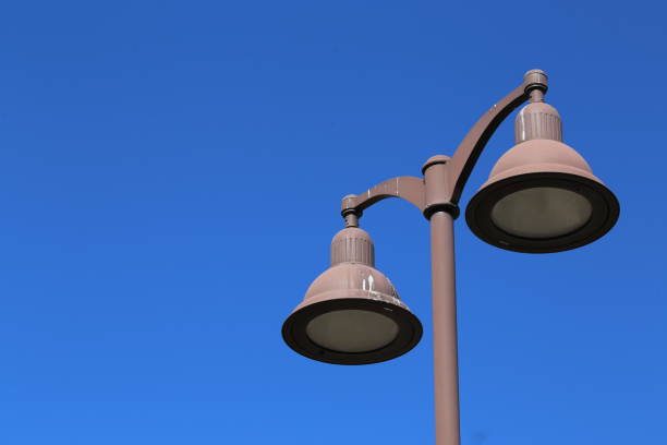 istock Low Angle View Of Street Light Against Clear Blue Sky 894710110