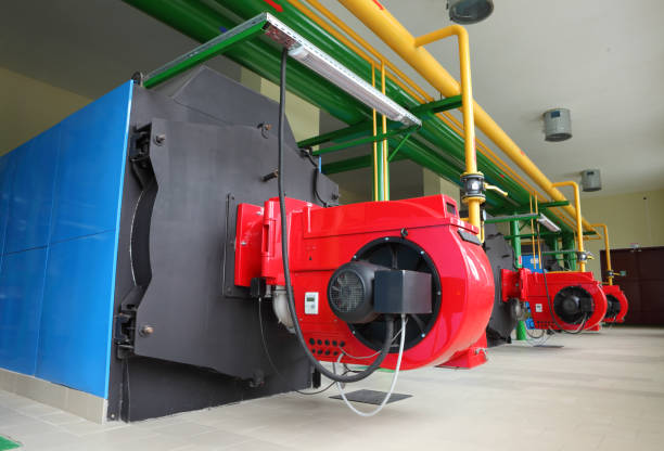 istock Gas boilers in gas boiler room 894711446
