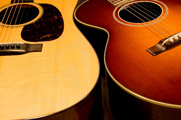 Pair of acoustic guitars stock photo