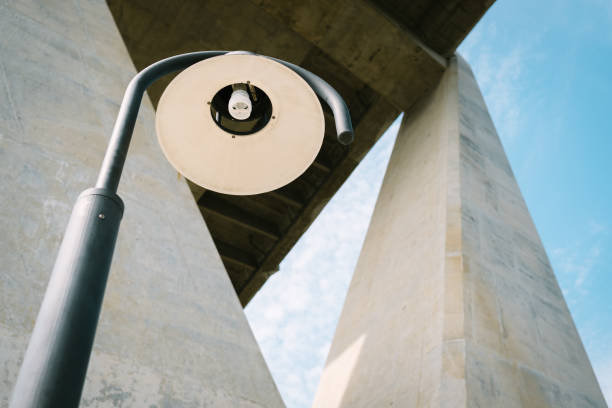 istock Low Angle View Of Street Light Against Bridge 894720548