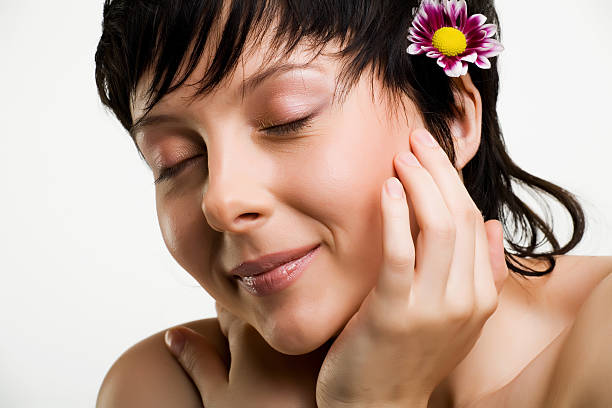 istock Close-up of beautiful face with flowers 89473411