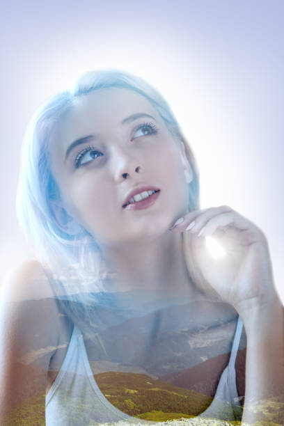 istock Nice dreamy woman looking up 894738482