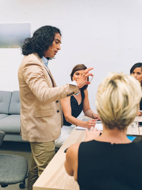 istock man leading team during a business meeting 894742586