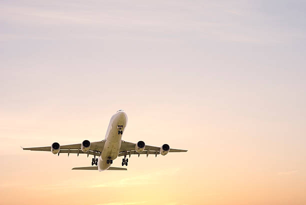 istock Four Engine Aircraft Arriving at Sunsrise 89476424